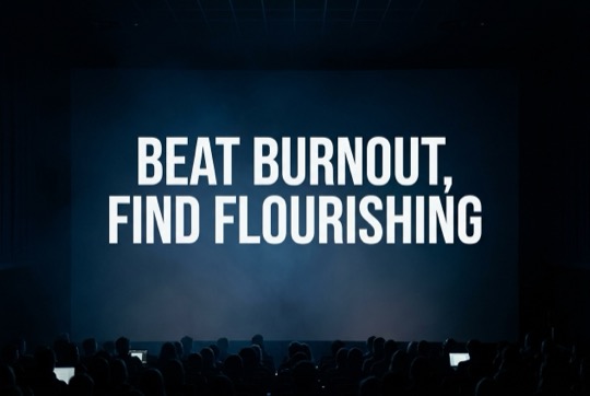 An AI-generated image of a talk title shown on a large, dimly lit conference screen above a silhouetted audience.