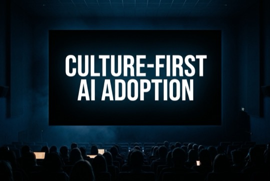 An AI-generated image of a talk title shown on a large, dimly lit conference screen above a silhouetted audience.